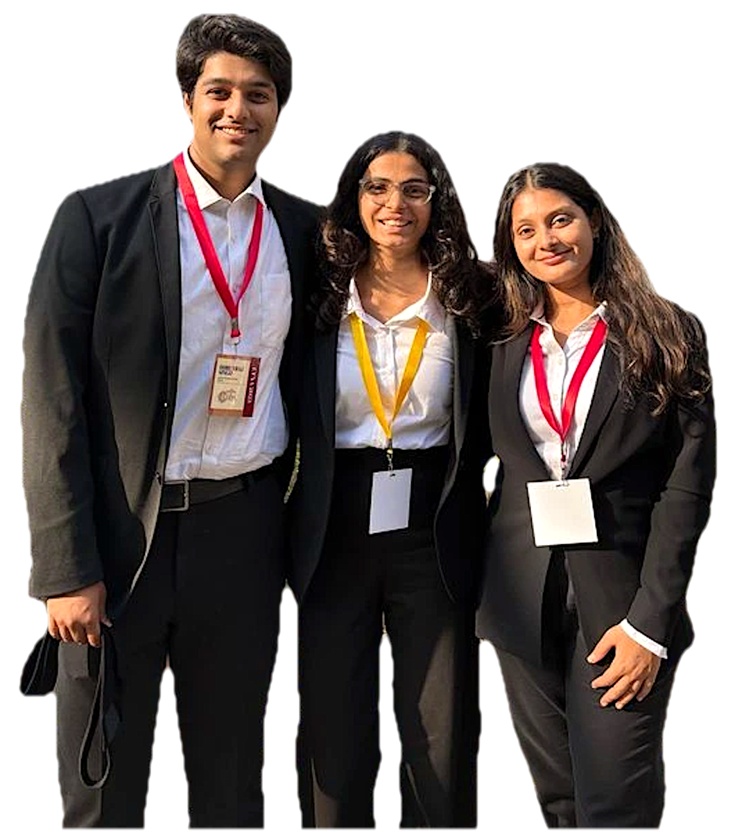 Three smiling students in school blazers
