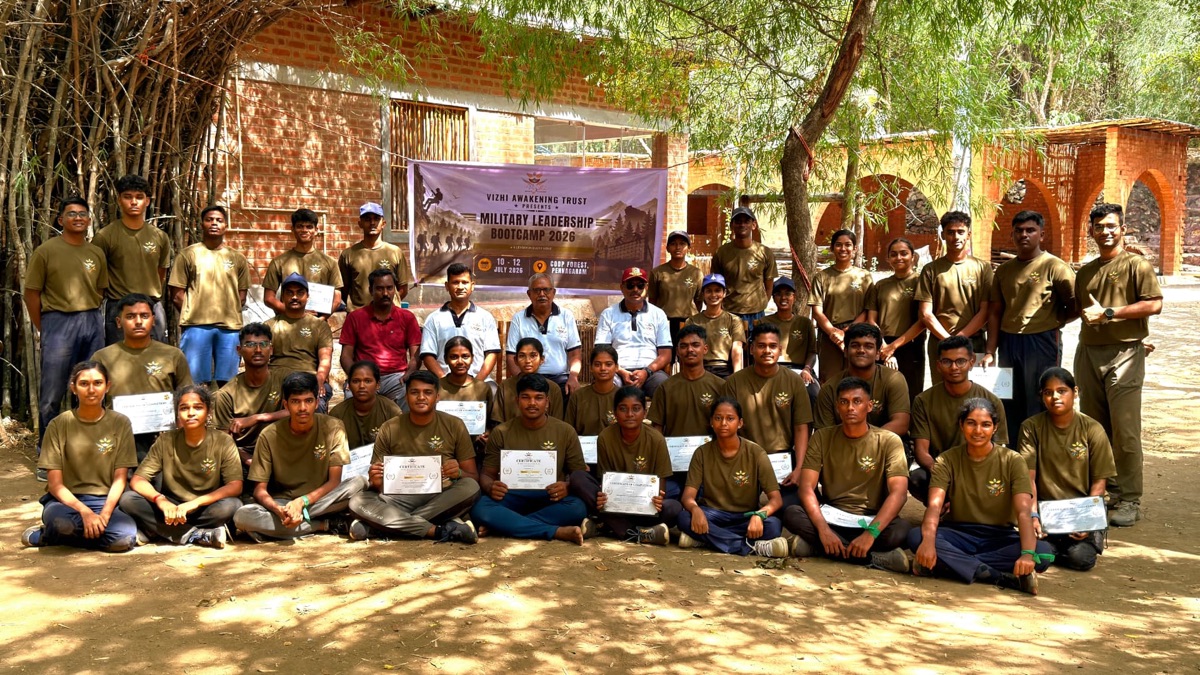 A large group of students celebrating together with certificates